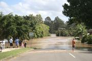 Jindalee Boat Ramp park was completely under water. The wildlife sign as at around 106 Mt Ommaney Drive. The roar of the water was nearly deafening.