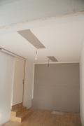 Temporary lighting installed, after filling in the holes from the previous recessed fluoros